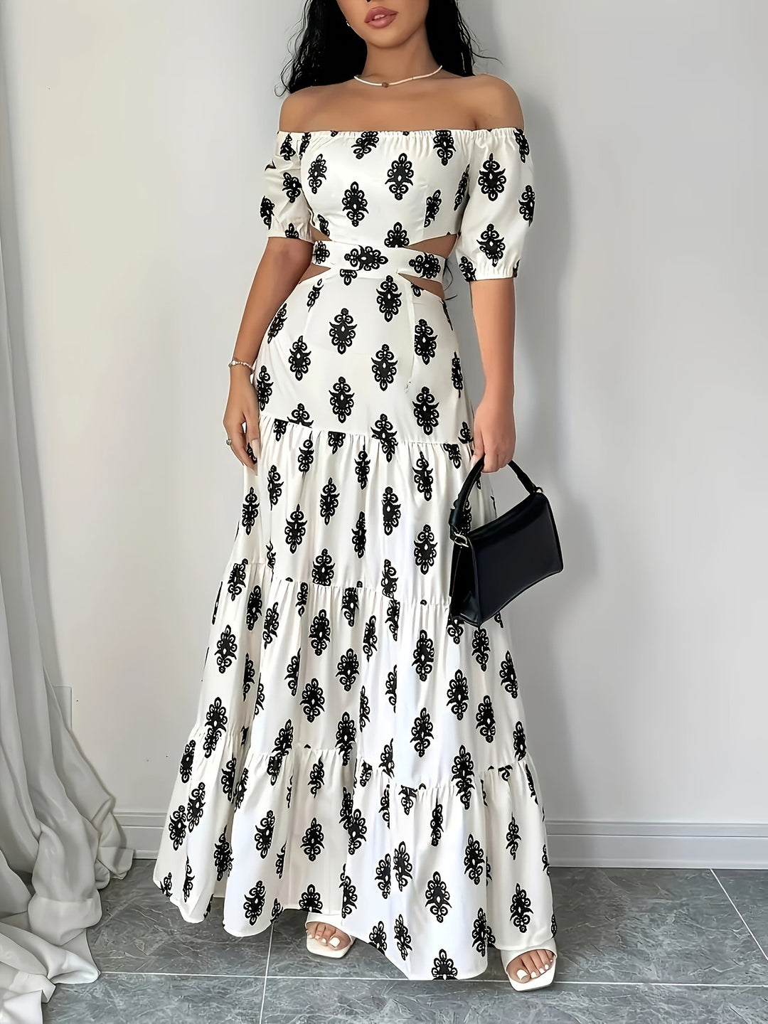 Damen Off-Shoulder Maxikleid mit Rüschendetails und floralen Mustern EB