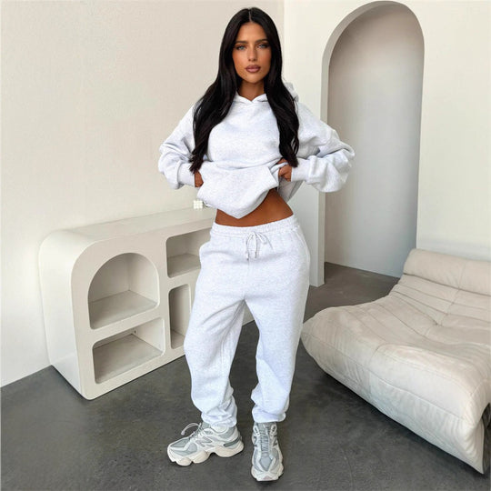 Damen Loungewear-Set mit oversized Kapuzenpullover und hochgeschnittener Kordelzug-Jogginghose aus Baumwollmischung EB