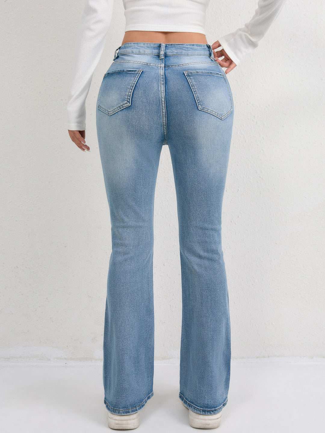 Damen Schlagjeans mit hohem Bund und figurformendem Design EB