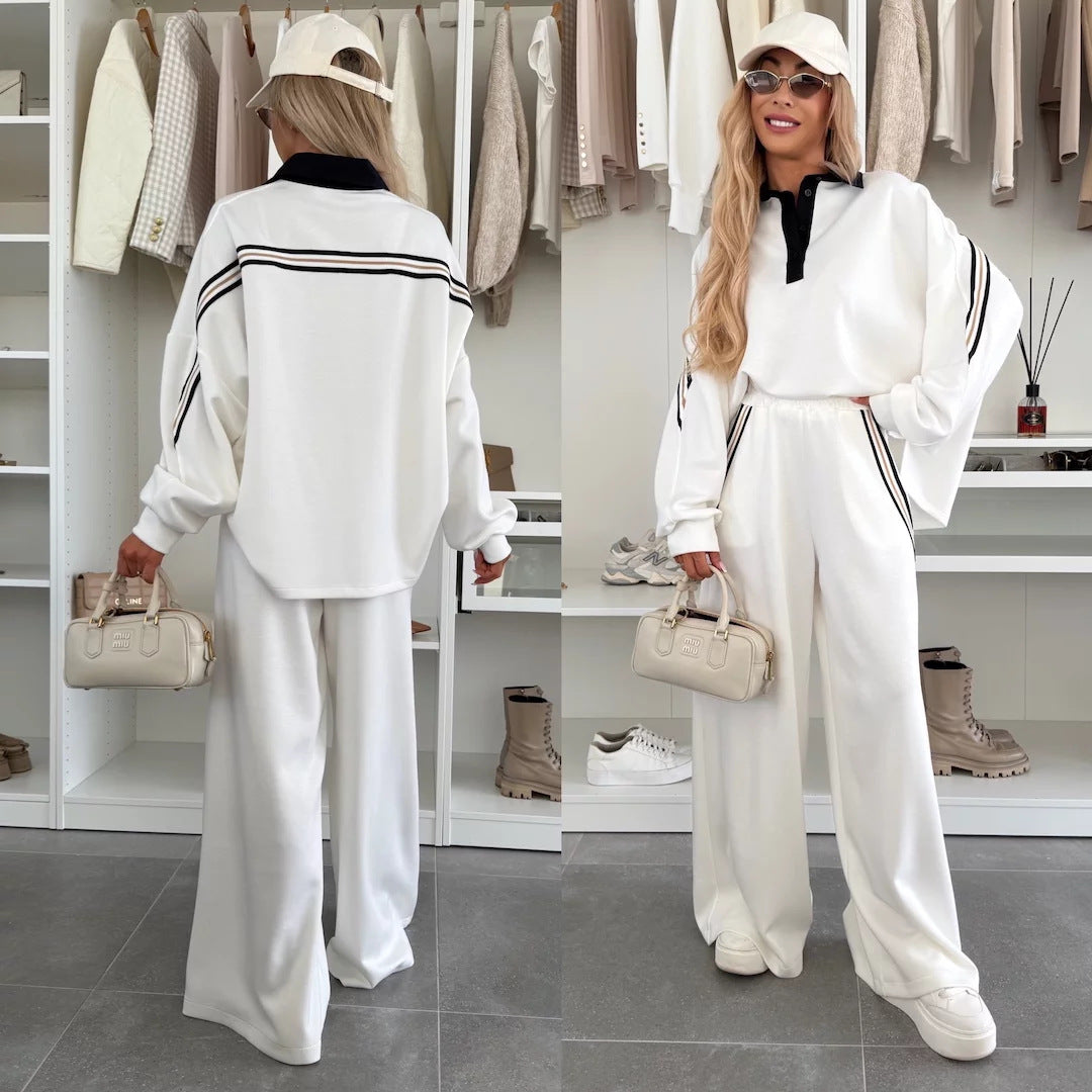 Damen modisches Relax-Set mit Polokragen, markanten Paspelstreifen und weitem Palazzo-Jogger EB
