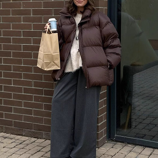 Damen Steppjacke im oversized Schnitt mit hohem Kragen und Taschen EB