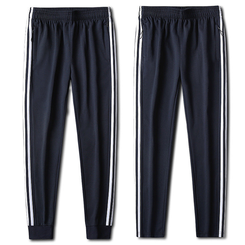 Herren Slim-Fit Trackhose mit seitlichen Kontraststreifen, Reißverschlusstaschen und elastischem Bund EB