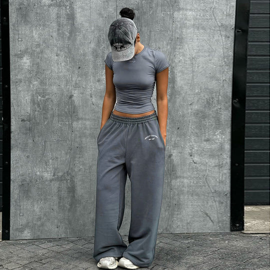 Damen Sportliches Set mit Figurbetontem Oberteil und weitem Hosen EB