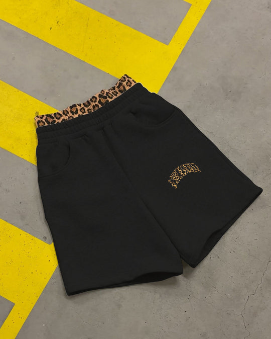 Damen nan hochgeschnittene Jogginghose mit ausgestelltem Bein, elastischem Rüschbund und Leo-Stickdetail EB