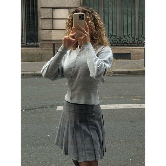 Damen modische Strickjacke mit plissierten Ärmeln und Knopfdetails EB
