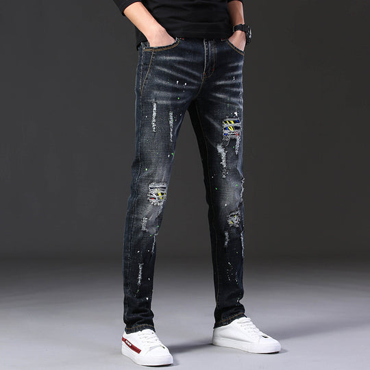 Herren Slim Fit Jeans mit kreativen Rissdesign und Farbklecksen EB