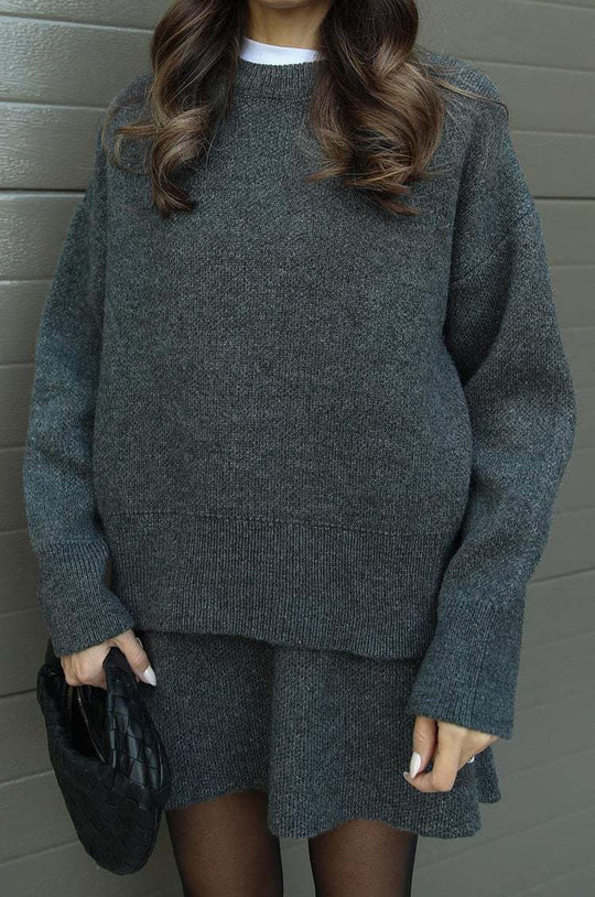 Damen bequemer Strickpullover mit überschnittenen Schultern und modischem Saum EB