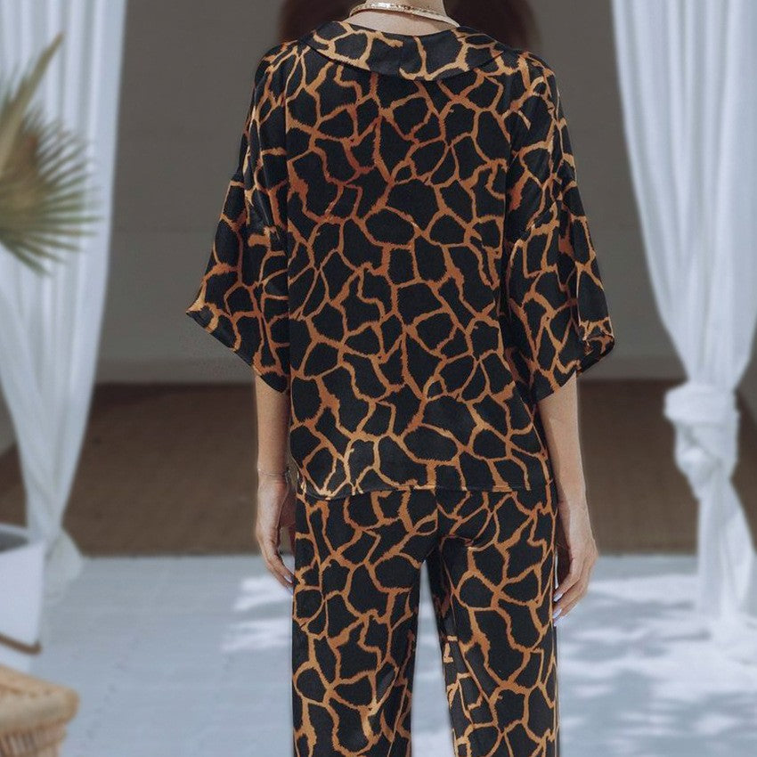 Damen Jumpsuit mit weit geschnittenen Beinen und elegantem Giraffenmuster EB