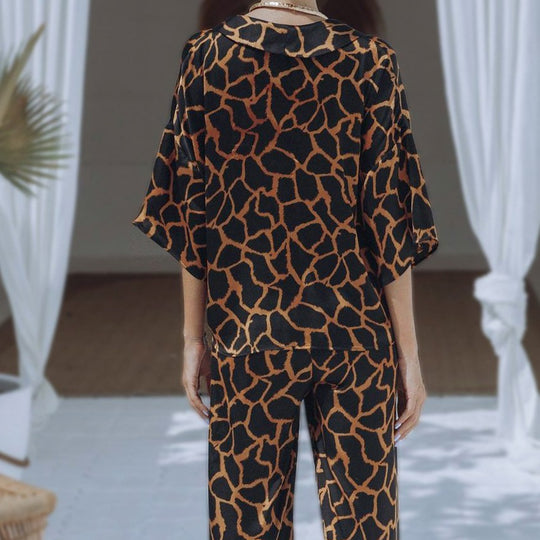 Damen Jumpsuit mit weit geschnittenen Beinen und elegantem Giraffenmuster EB