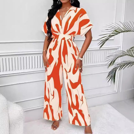 Damen Eleganter Jumpsuit mit großflächigem Muster und V-Ausschnitt EB