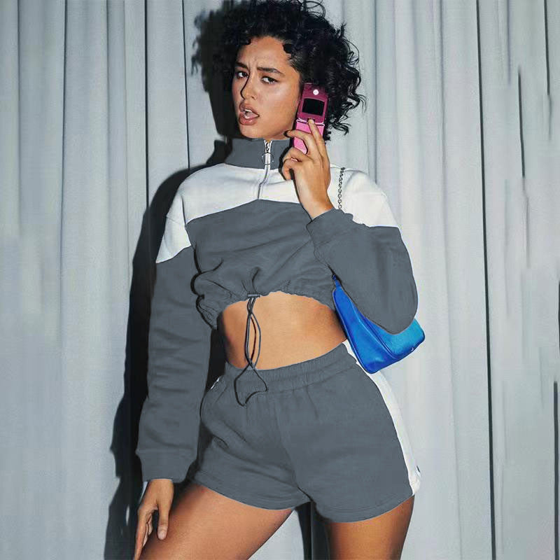 Damen modernes Sportoberteil mit kurzem Schnitt und dazu passender Shorts EB