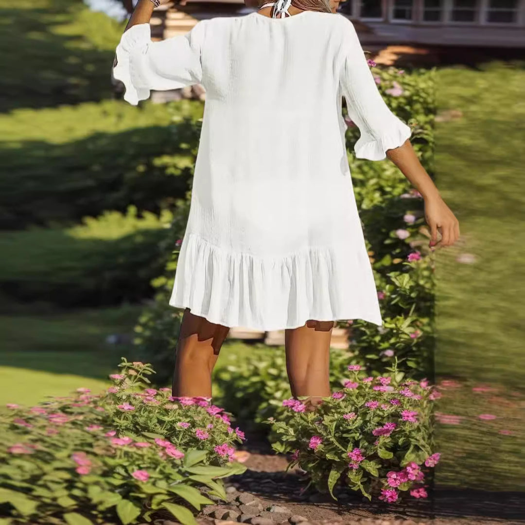 Damen Shirtkleid mit Puffärmeln und Volantabschluss EB