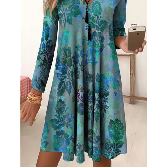 Damen V-Ausschnitt Freizeitkleid mit floraler Gestaltung und seitlichen Taschen EB