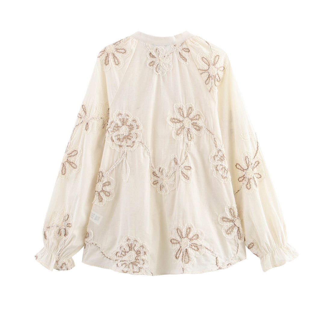 Damen Bluse mit floralem Stickmuster und eleganten Quasten EB