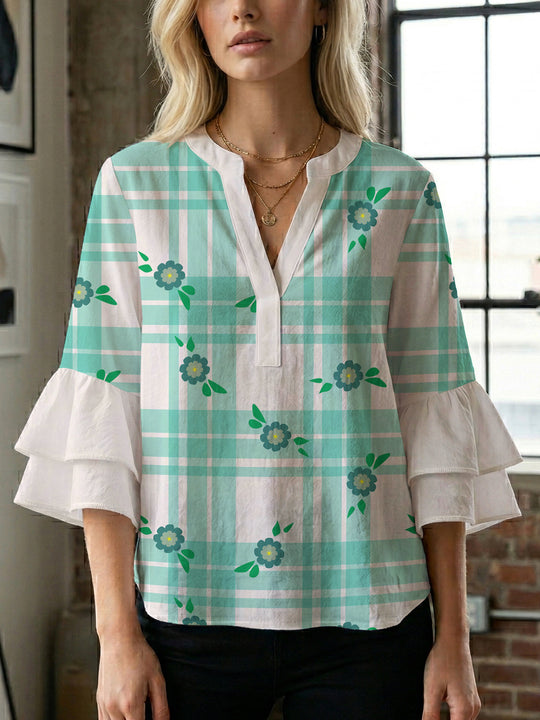 Damen Bluse mit voluminösen Flügelärmel und intensivem Blattmuster EB
