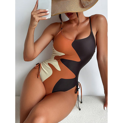 Damen Einteiler Badeanzug mit asymmetrischem Muster und verstellbarem Bindeband EB