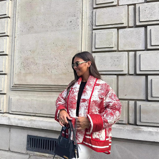 Damen Steppjacke mit floralem Design und eleganten Taschen EB