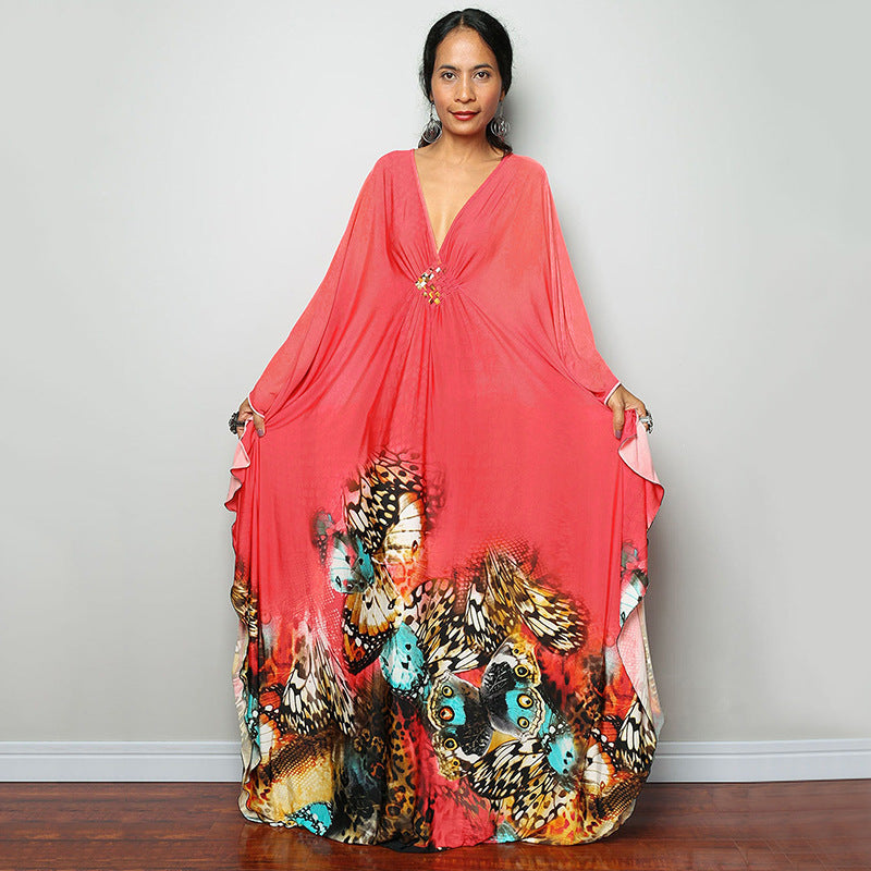 Damen Maxikleid mit kunstvollem Pfauenmuster und seitlichen Schlitzen Heidi Mode