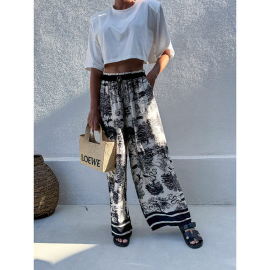 Damen Weite Sommerhose mit floralem Muster und elastischem Bund EB