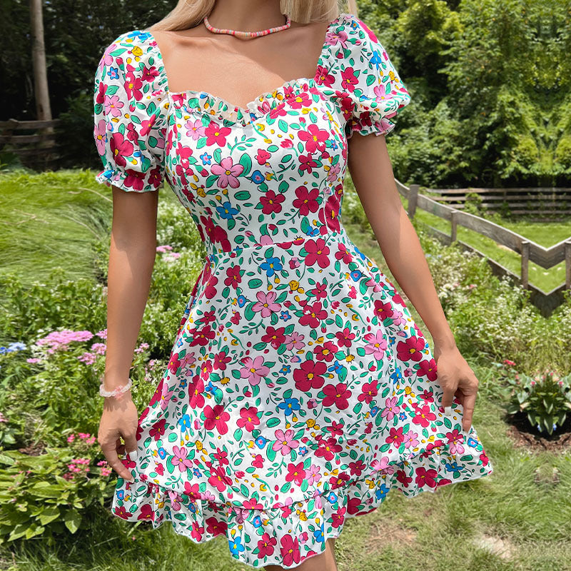Damen Sommerkleid mit voluminösen Ärmeln und floralem Design EB