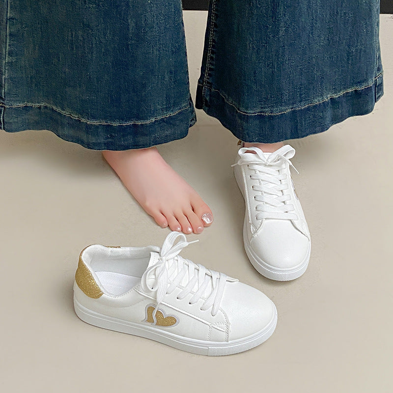 Damen Sneakers mit Glitzerelementen und Herzmotiv EB
