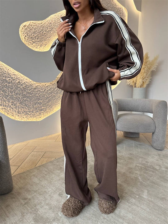Damen weiches Oversize-Zweiteiler Trainingsset mit Reißverschlussjacke und weiter hochgeschnittener Jogginghose mit Kontraststreifen Eichborn Berlin