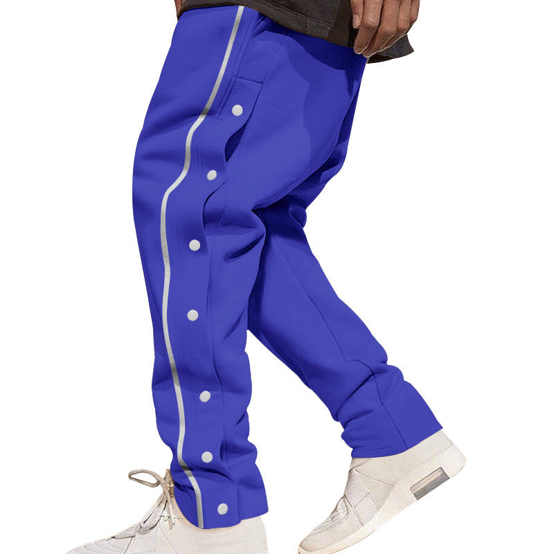 Herren nan weite Trackpants mit seitlicher Druckknopfleiste, elastischem Bund und reflektierendem Streamline-Streifen EB