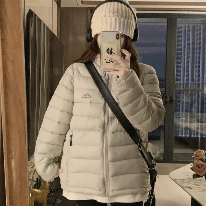 Damen Wattierte Outdoor-Jacke mit praktischen Reißverschlusstaschen und hohem Kragen EB