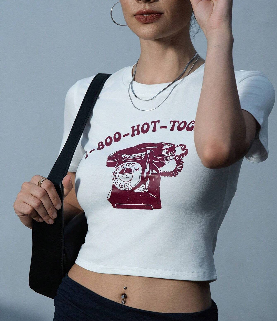 Damen Crop-T-Shirt mit kreativem Telefon-Design EB