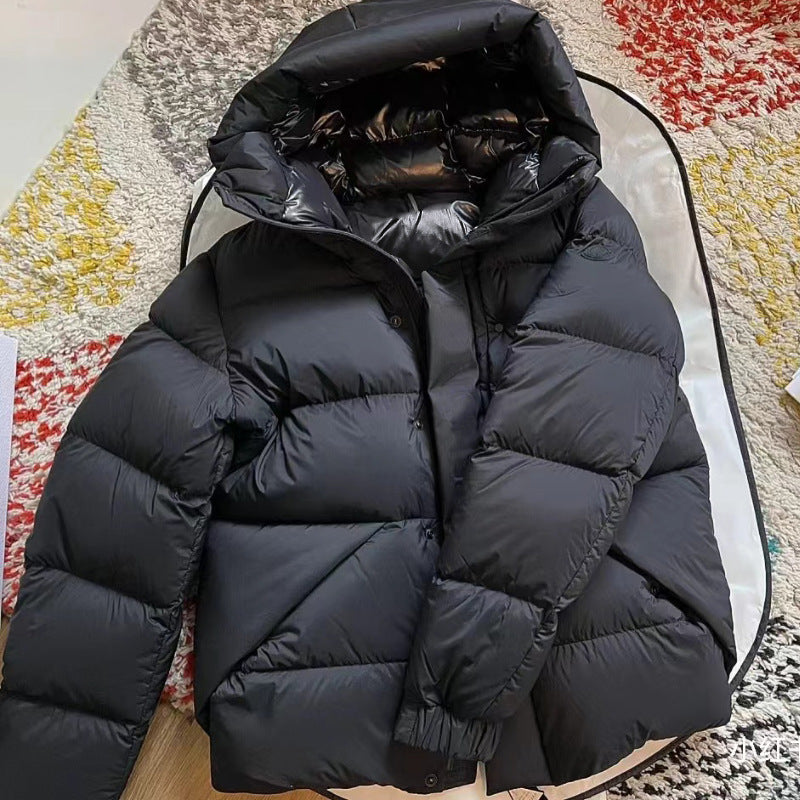 Damen Daunenjacke mit hohem Kragen und praktischen Reißverschlusstaschen EB