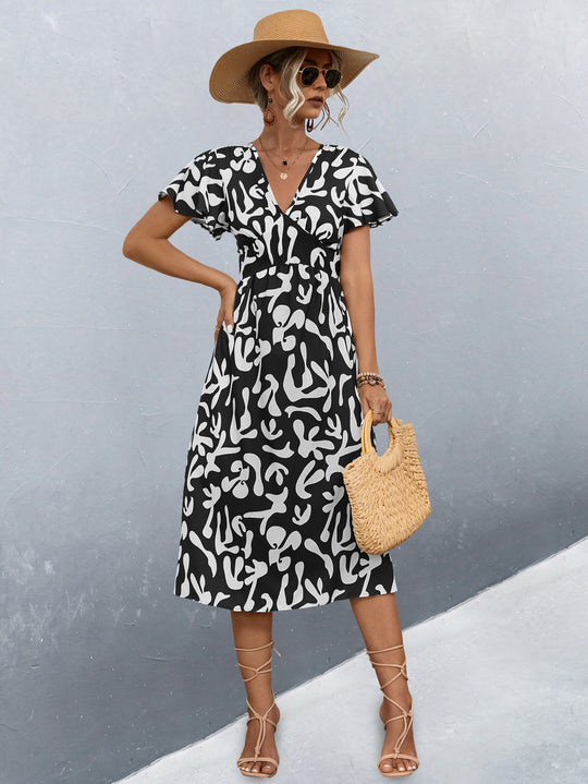Damen Wickelkleid mit floralem Muster und eleganter Raffung EB