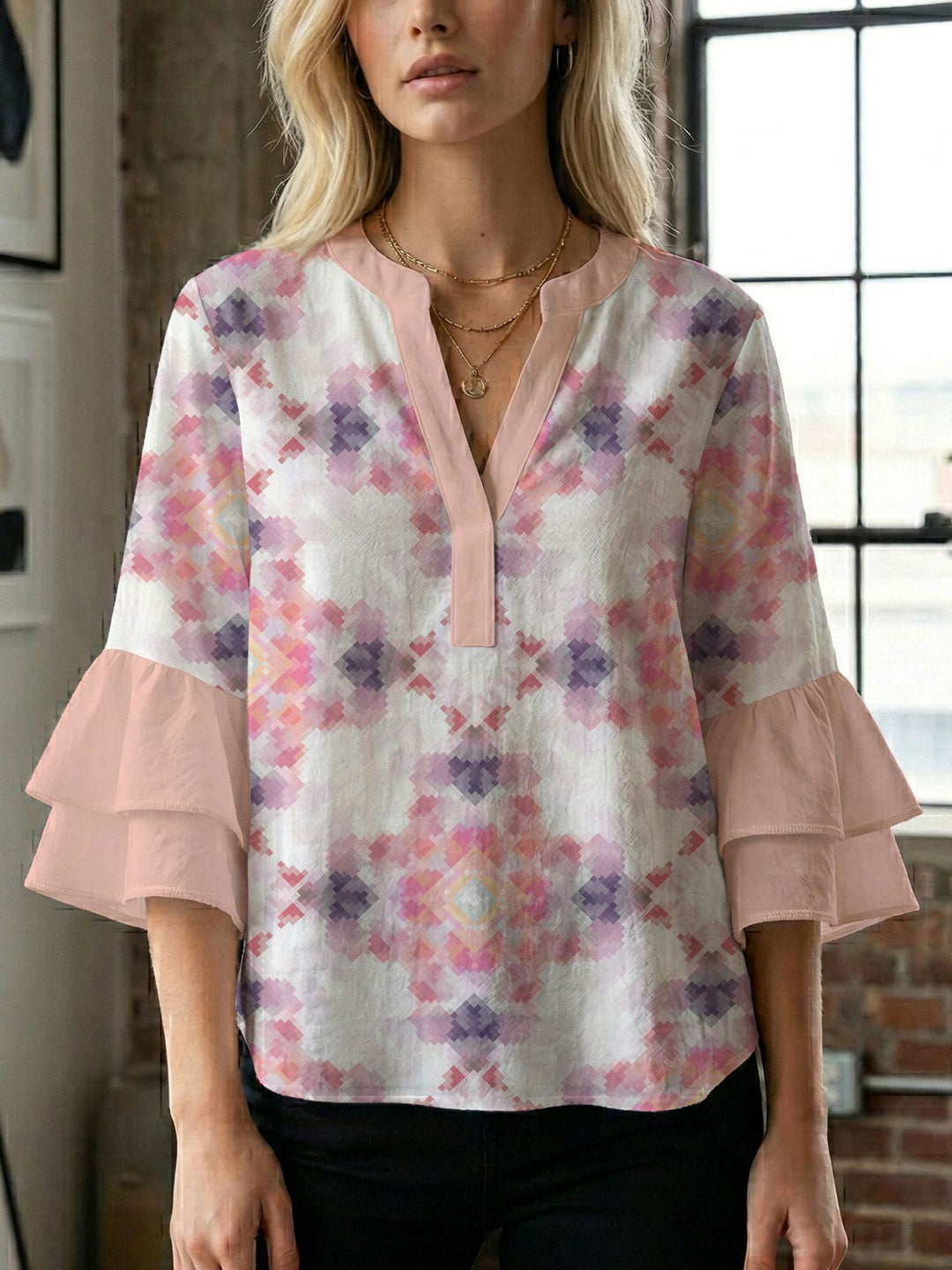 Damen Blusenshirt mit voluminösen Ärmeln und kreativem Druckdesign EB