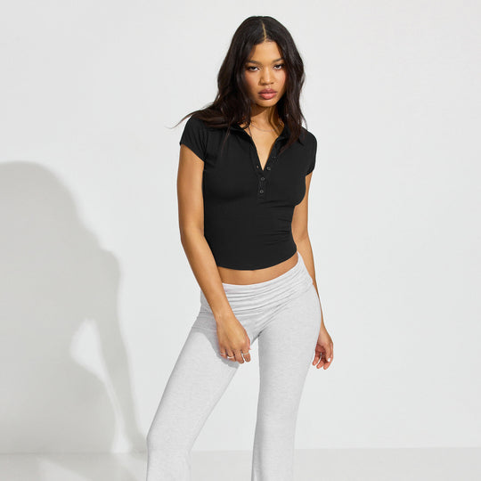 Damen Polo-Shirt mit kurzem Schnitt und modischer Knopfleiste EB