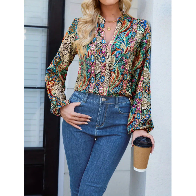 Damen elegante Bluse mit buntem Print und extravaganten Puffärmeln EB