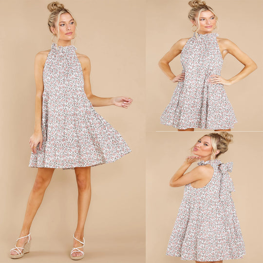 Damen Neckholder-Kleid mit verspielt-floralem Design und Rüschendetails EB