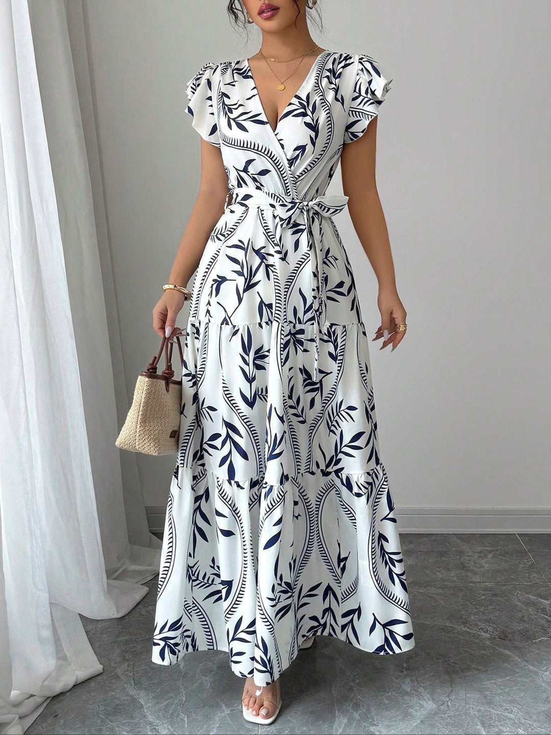Damen Maxikleid im boho-inspirierten Design mit floralen Elementen und taillierbarem Gürtel EB
