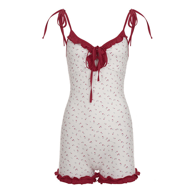 Damen verspielter Jumpsuit mit floralen Akzenten und Rüschendetails EB