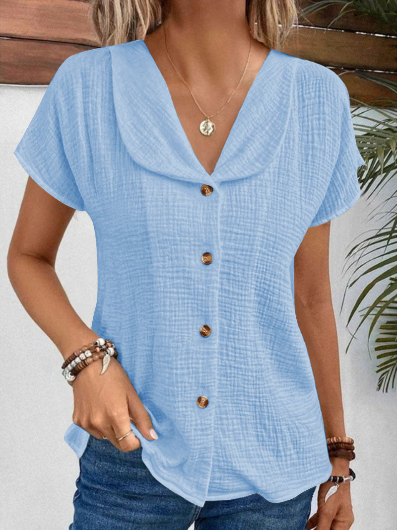 Damen Blusenshirt mit stilvollem Schalkragen und dekorativen Knopfdetails EB