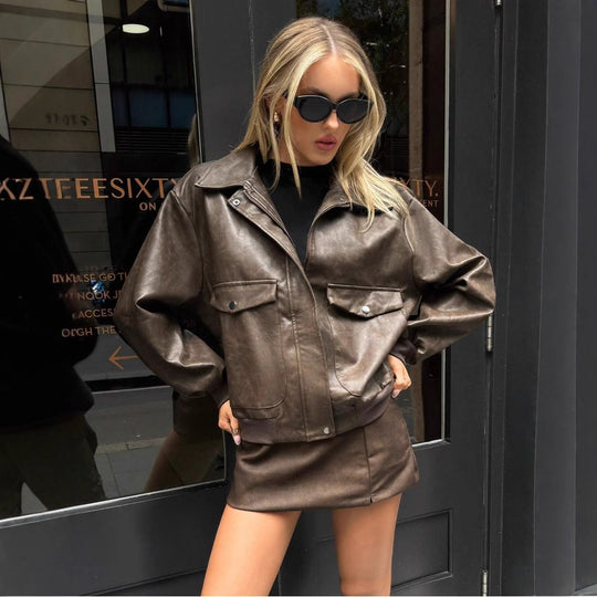Damen Lässige und stylische Kunstlederjacke mit praktischen Taschen EB