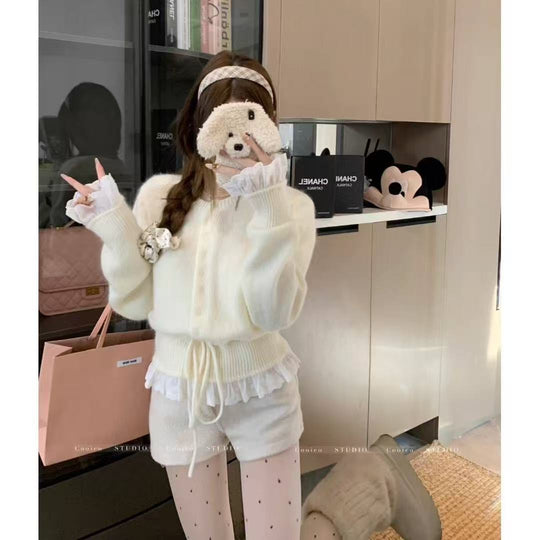 Damen kuscheliger Strickjacke mit fransigen Details und Bändchen EB