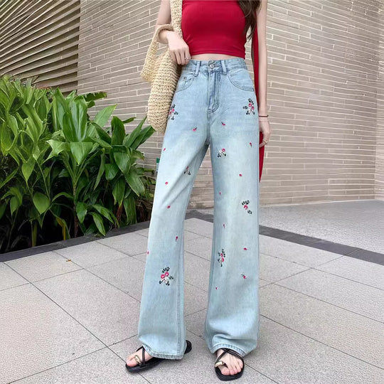 Damen Weite Jeanshose mit floralen Stickereien und hohem Bund EB
