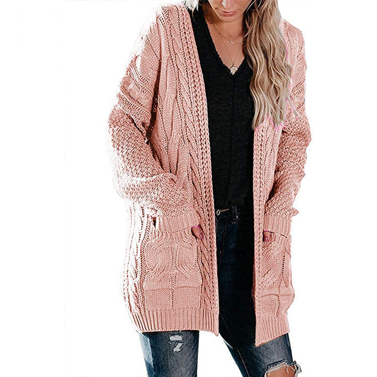 Damen Grobstrickjacke mit femininer Silhouette und praktischen Taschen EB