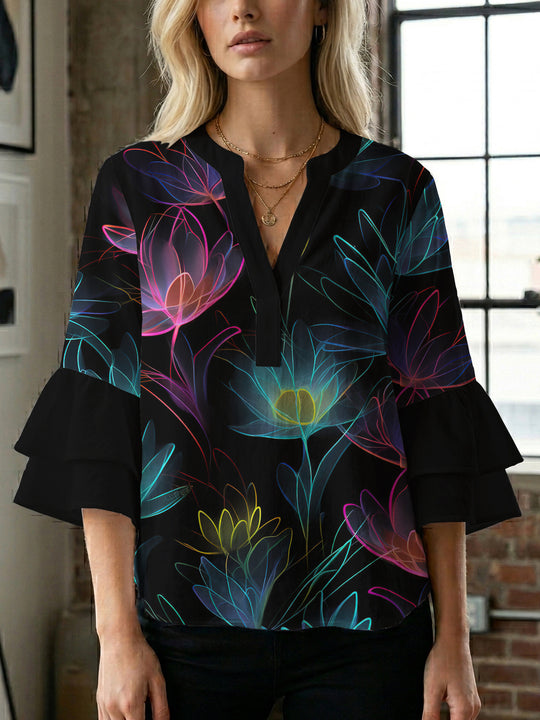 Damen Bluse mit voluminösen Rüschenärmeln und floralem Muster EB