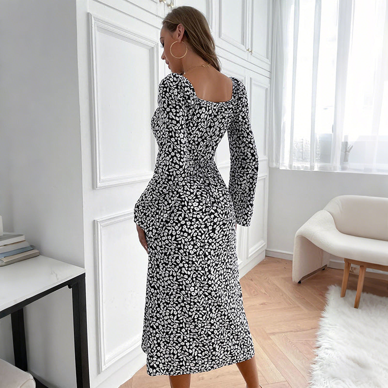 Damen Blumen-Midikleid mit taillierter Wickeloptik und ausgestellten Trompetenärmeln EB