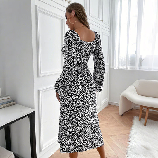 Damen Blumen-Midikleid mit taillierter Wickeloptik und ausgestellten Trompetenärmeln EB