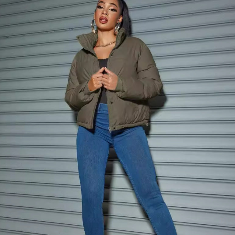 Damen Steppjacke mit hochabschließendem Kragen und figurbetontem Schnitt EB