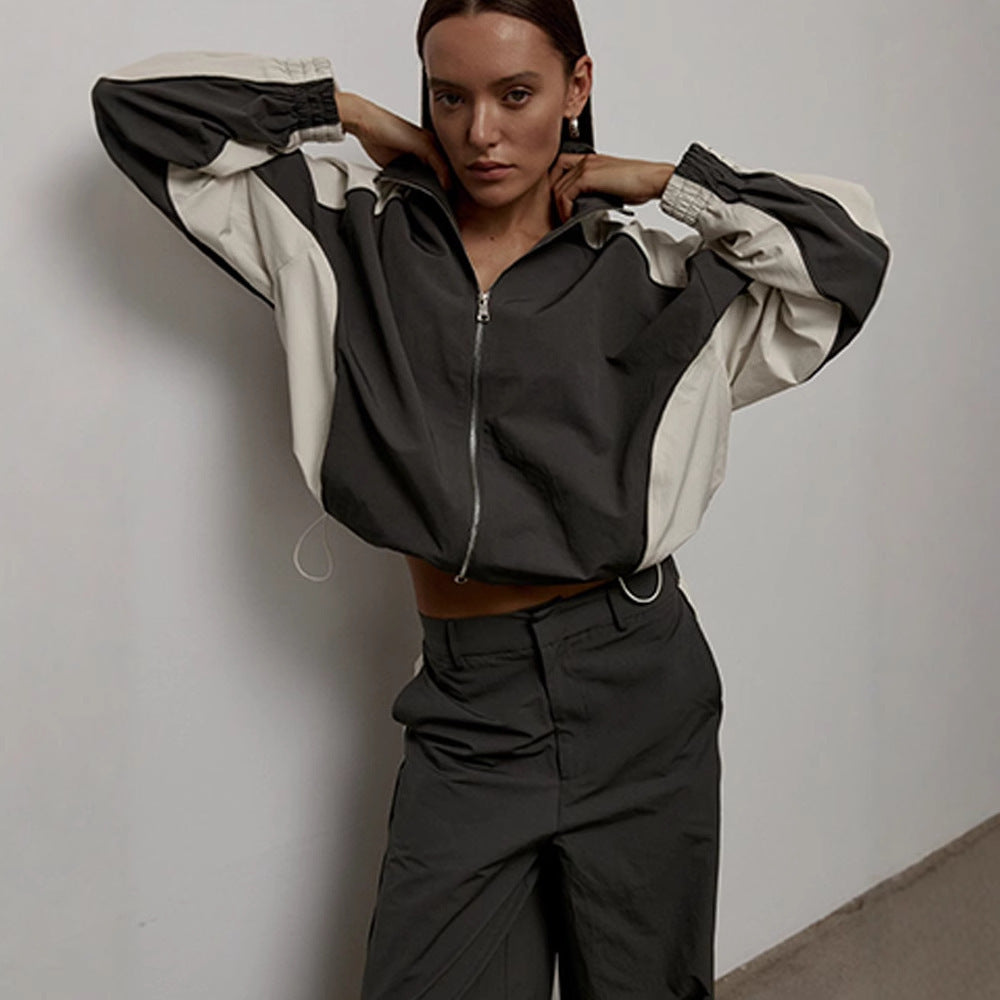 Damen Sportjacke mit hoch stehendem Kragen und kontrastierenden Ärmeln EB