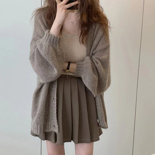 Damen Modische Strickjacke mit weiten Ärmeln und eleganten Details EB
