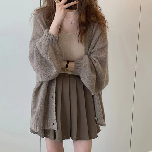 Damen Modische Strickjacke mit weiten Ärmeln und eleganten Details EB