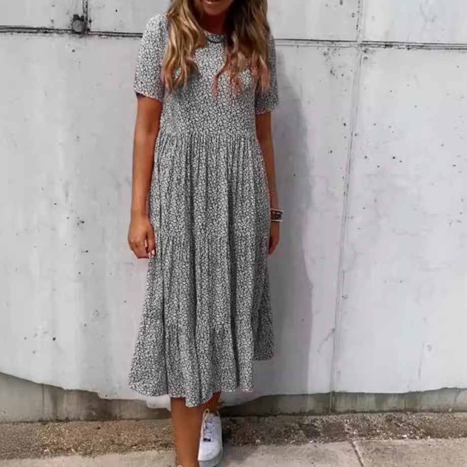 Damen nan geblümtes gekrepptes Midikleid mit geraffter Empire-Taille, kurzen Ärmeln und stufigem Volantrock EB